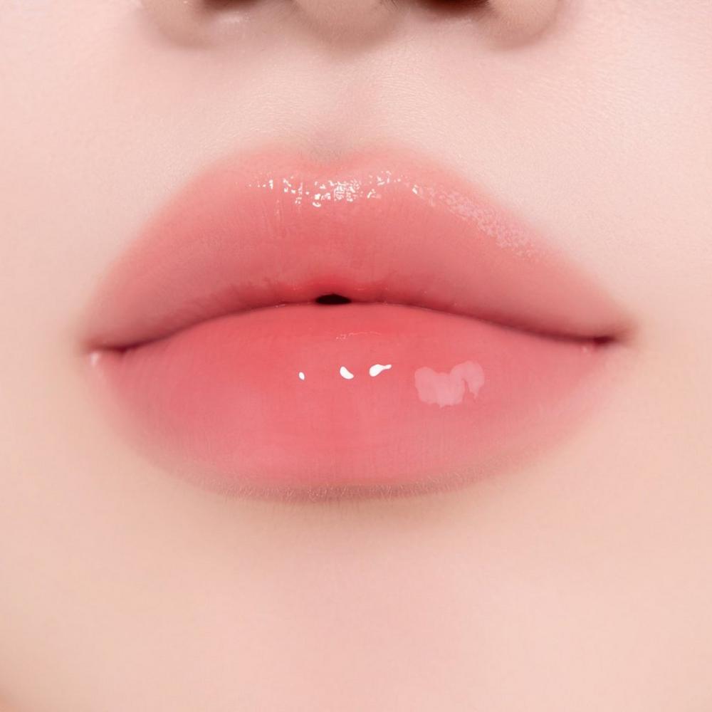 Unleashia Sunset Dazzle Gloss Balm No.1 Malibu lip swatch
